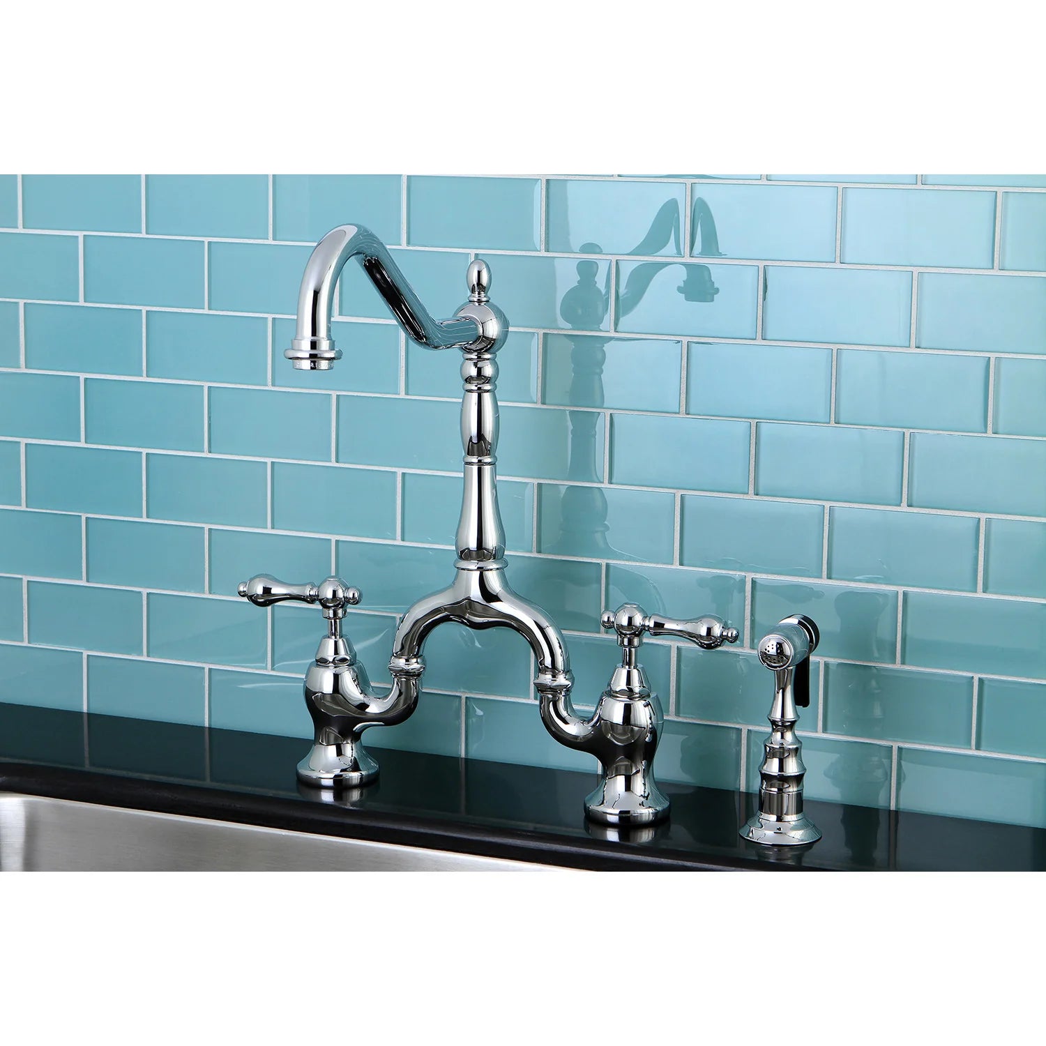 Polished chrome bridge kitchen faucet with side sprayer and cross handles
