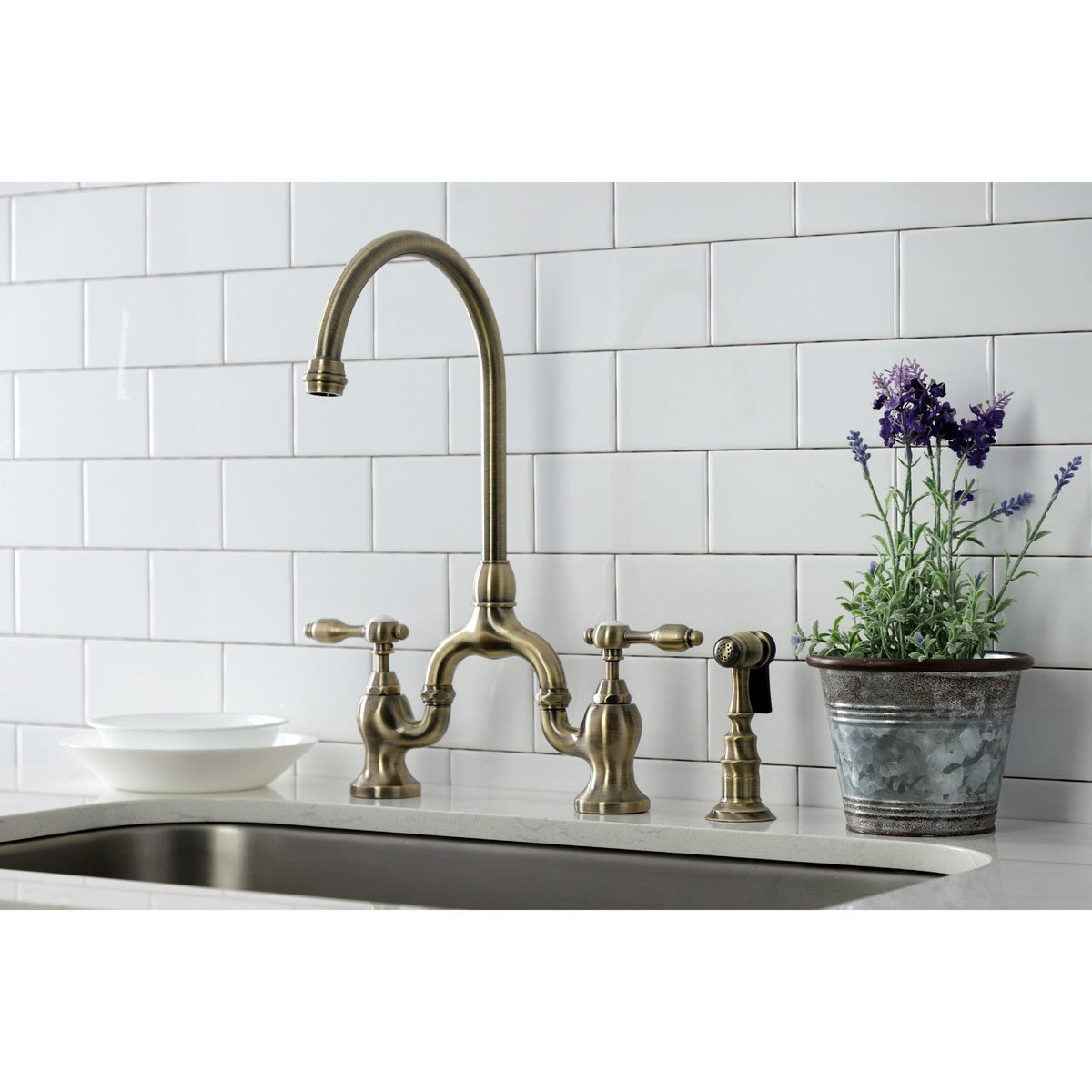 Tudor Bridge Kitchen Faucet with Brass Side Sprayer in Antique Brass