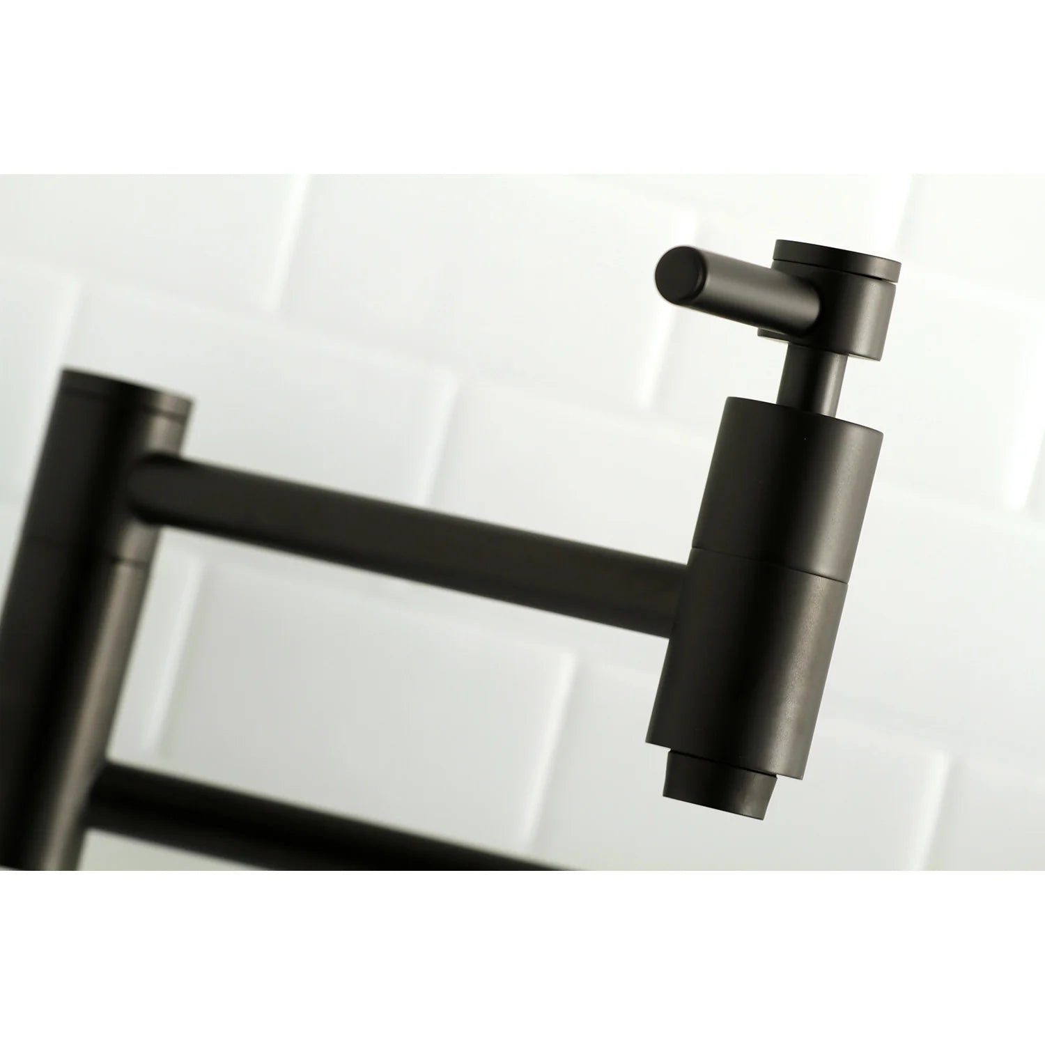 Matte black wall mount pot filler faucet with tall spout and cylindrical control