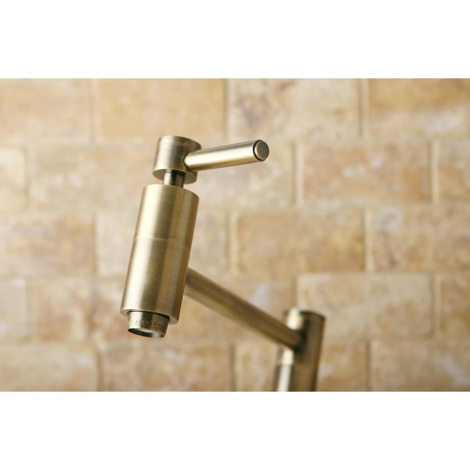 Antique brass wall-mount pot filler faucet with vertical spout and outlet opening