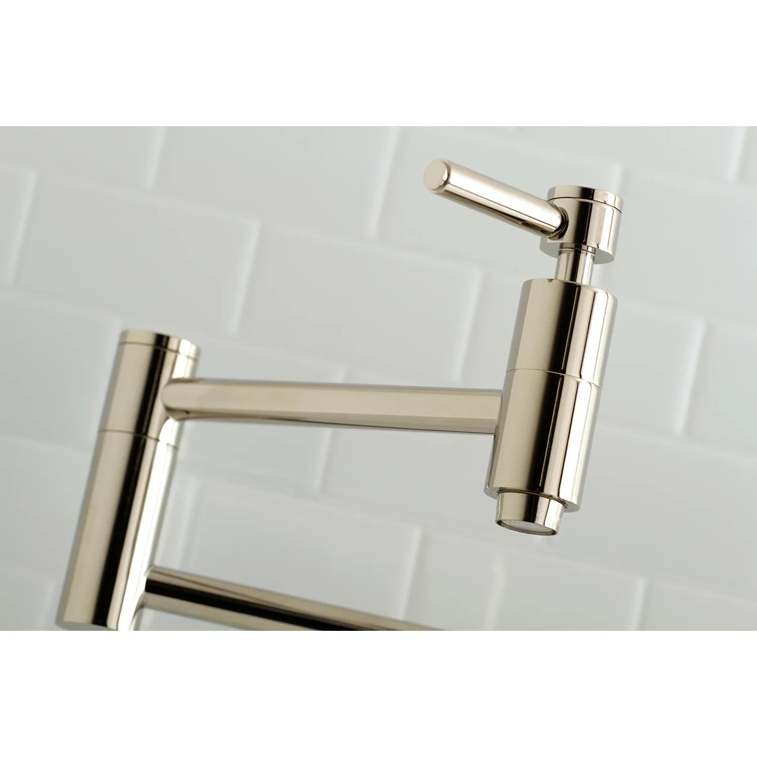 Polished nickel wall-mount pot filler faucet spout with cylindrical diverter housing