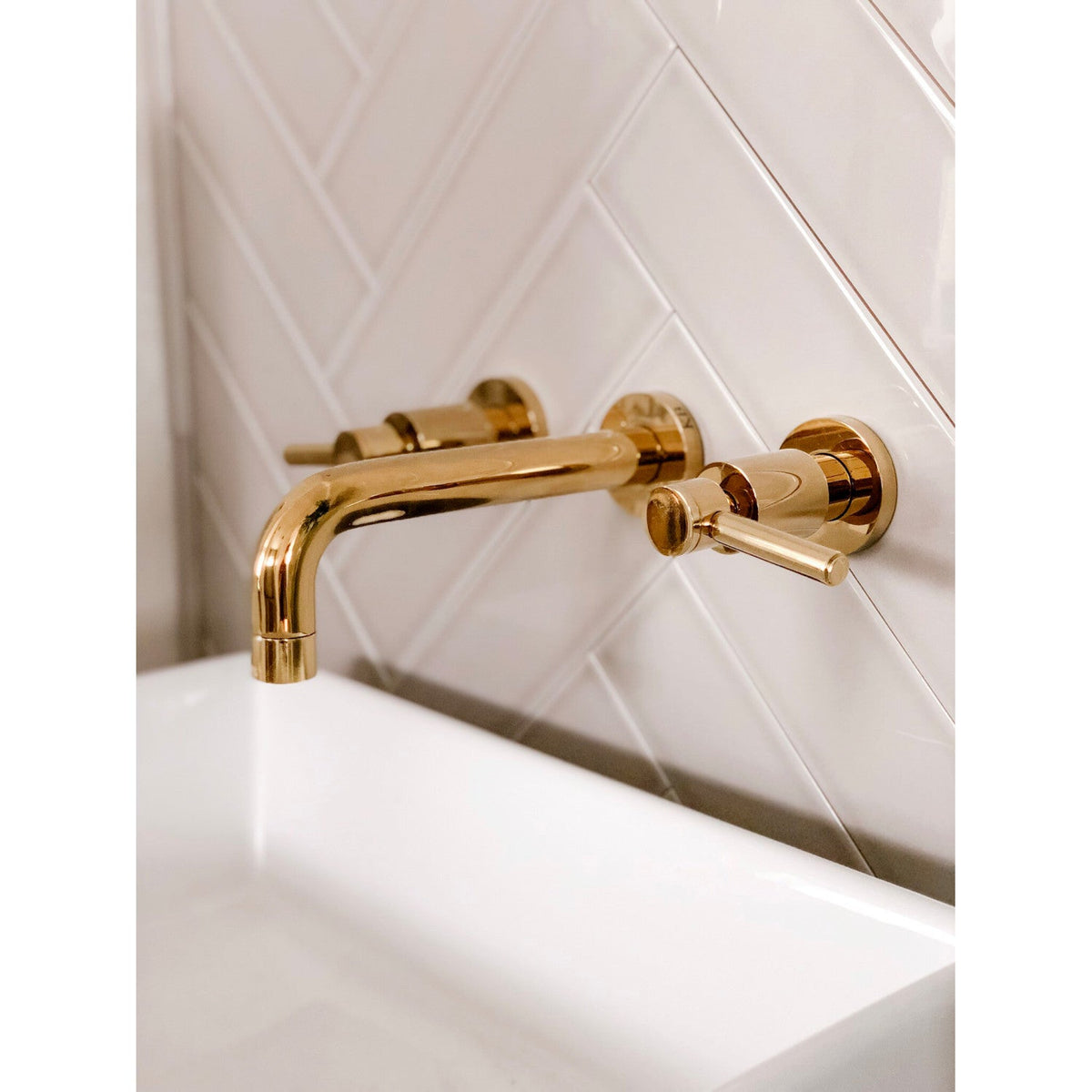 Concord Double-Handle Wall Mount Bathroom Faucet in Polished Brass