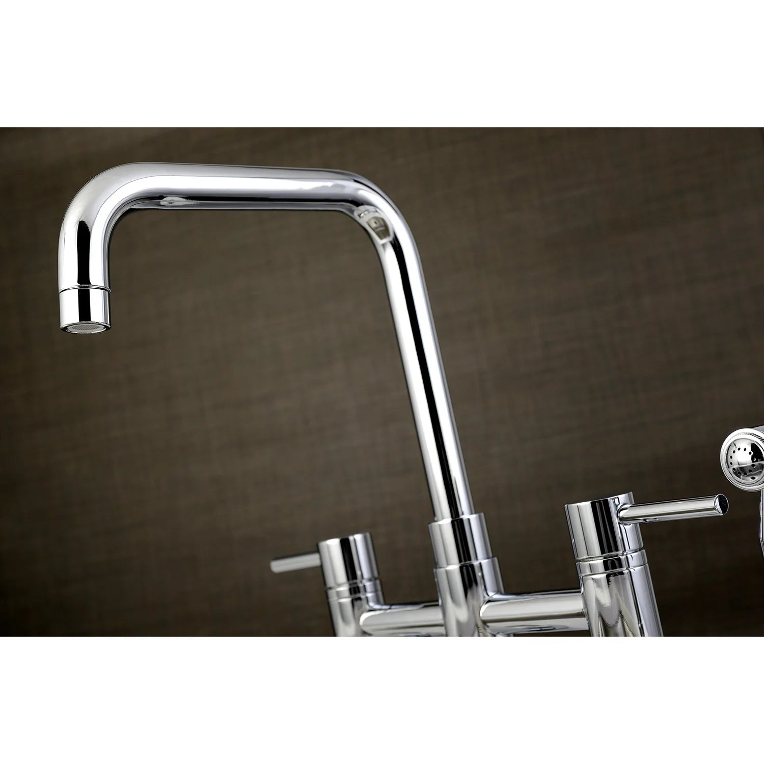 Polished chrome arched bridge kitchen faucet with side sprayer and handles