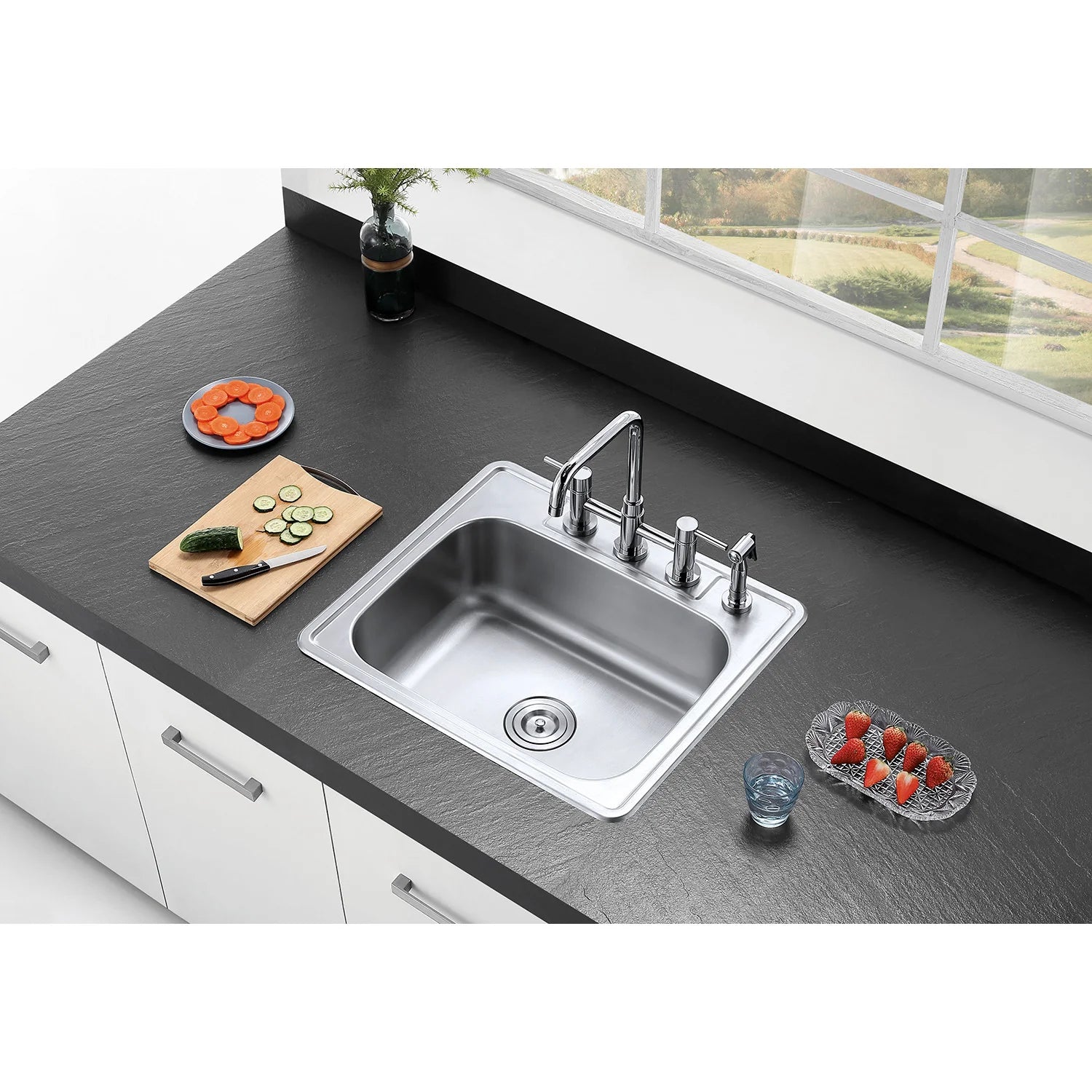 Polished chrome bridge kitchen faucet with side sprayer and 4 handles on sink