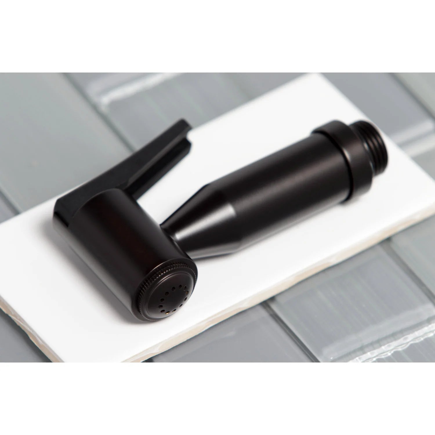 Oil-rubbed bronze side sprayer nozzle with round spray holes