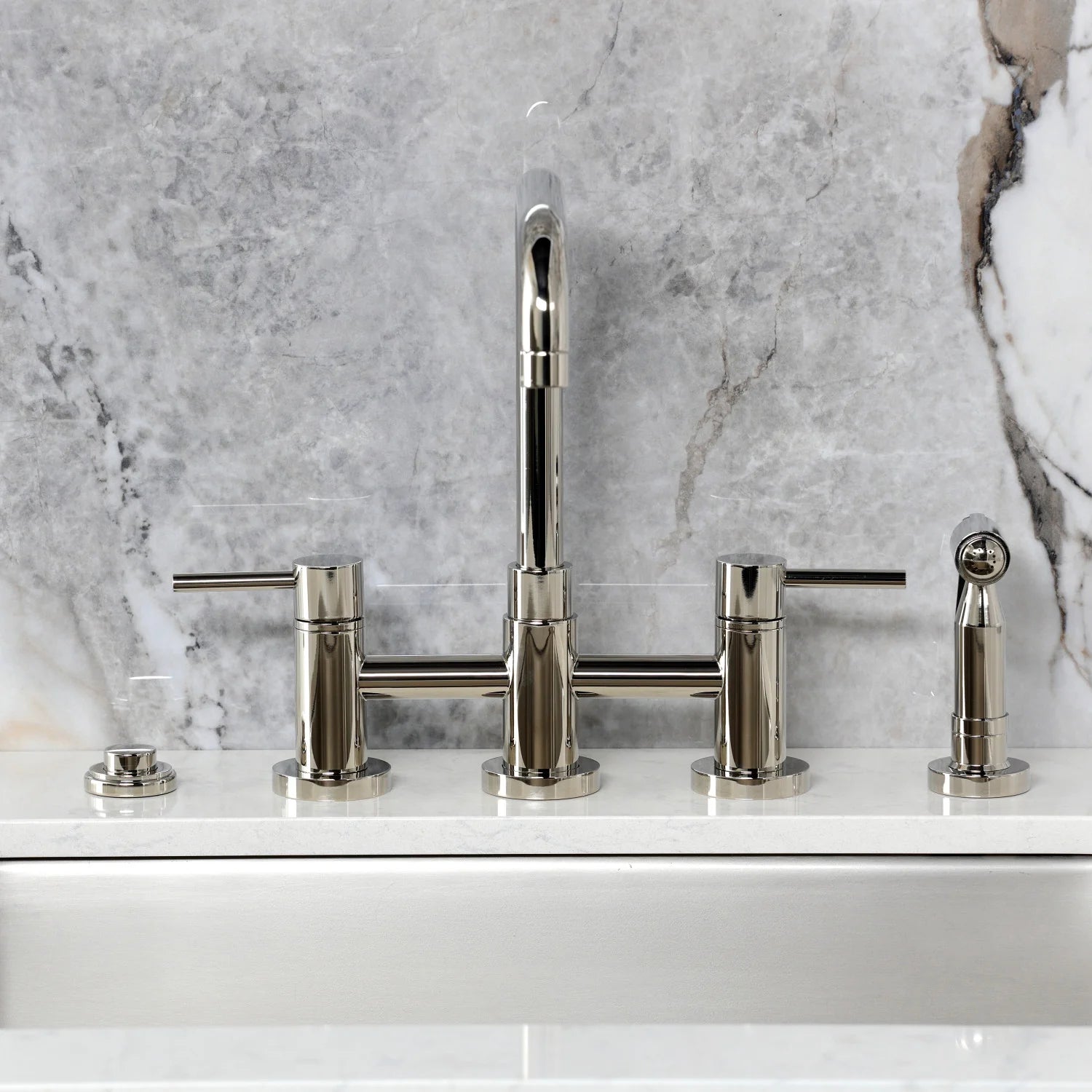 Polished nickel widespread deck faucet with tall center spout and two side handles