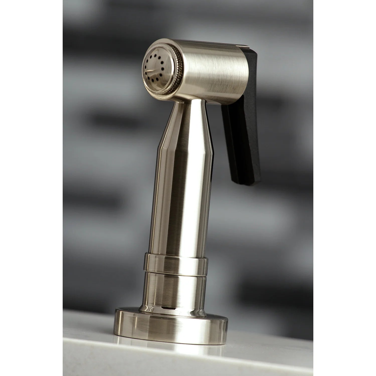 Brushed nickel side sprayer with spray head and black trigger lever