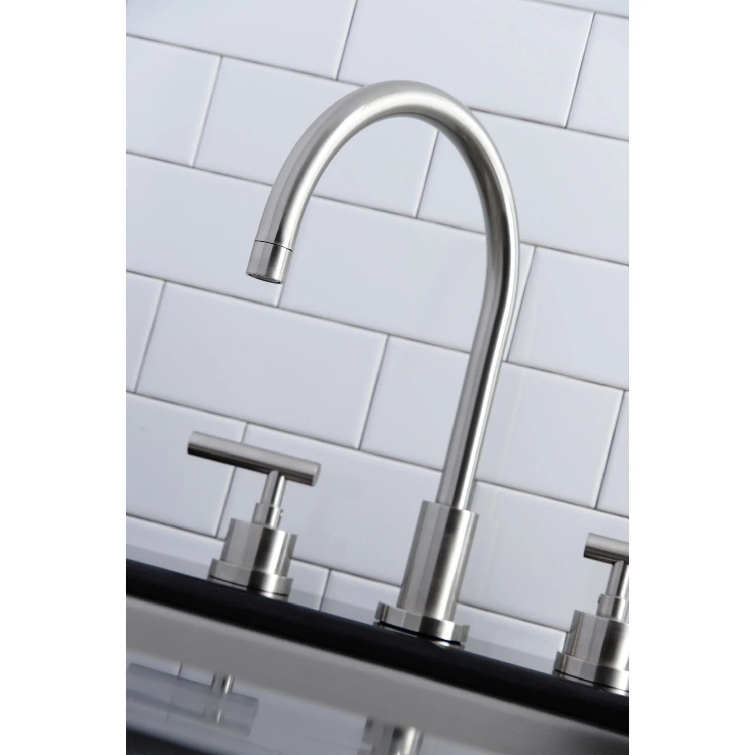 Tall brushed nickel gooseneck kitchen faucet with lever handle and deck base