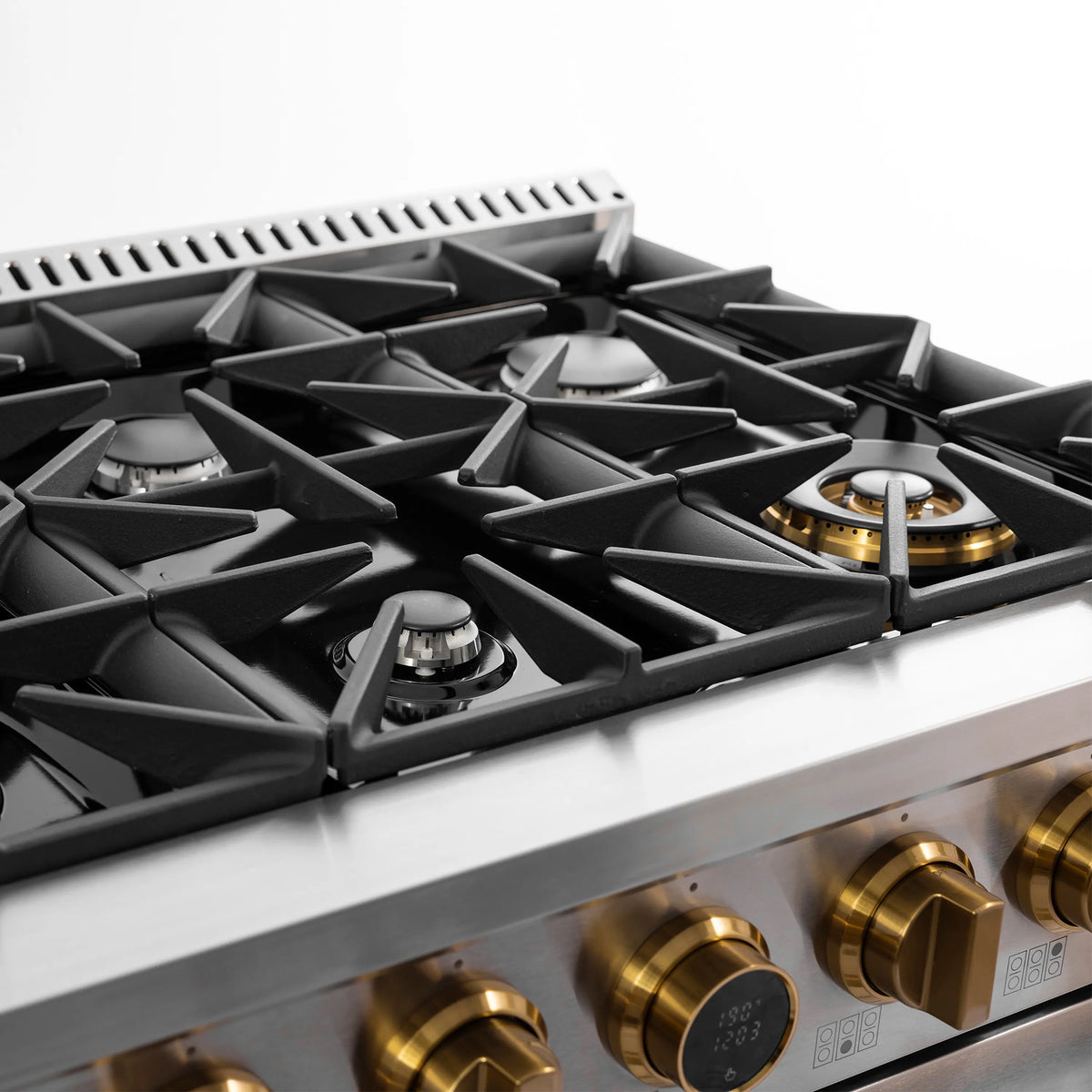 Stainless steel propane gas range cooktop with black grates and round burner caps