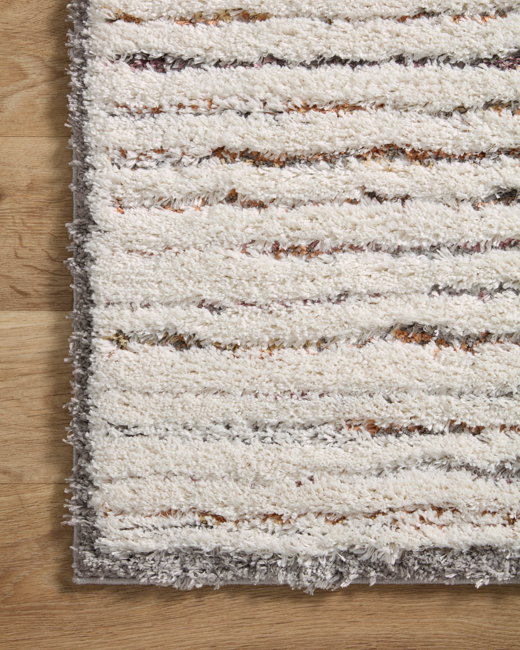 Ivory shag runner rug with short pile and multicolor horizontal stripe lines
