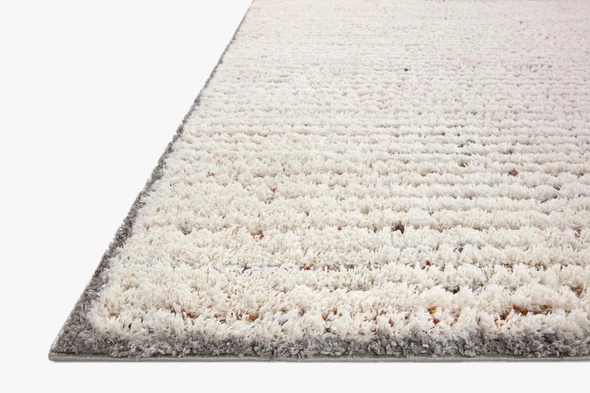 Ivory shag accent rug with gray border, plush high-pile texture