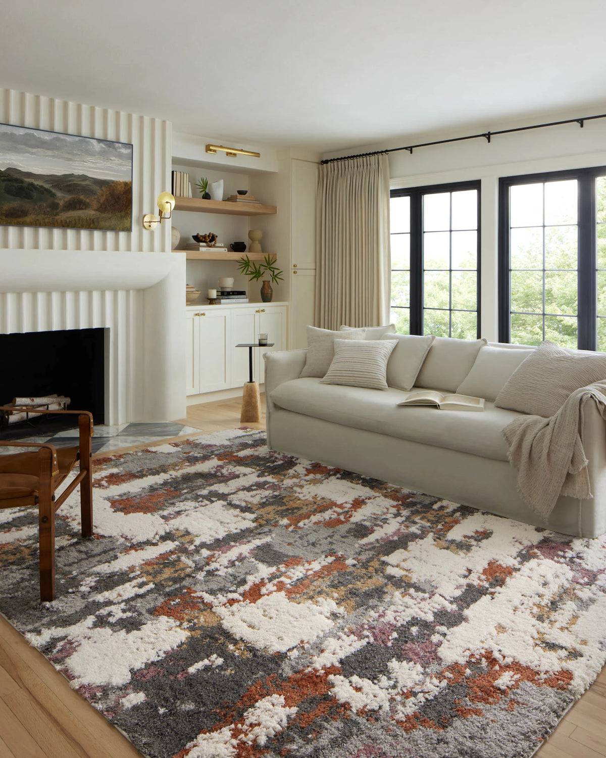 Multicolor shag area rug with grey and cream abstract blocks