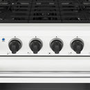 White gas range control panel with multiple black knobs labeled Off