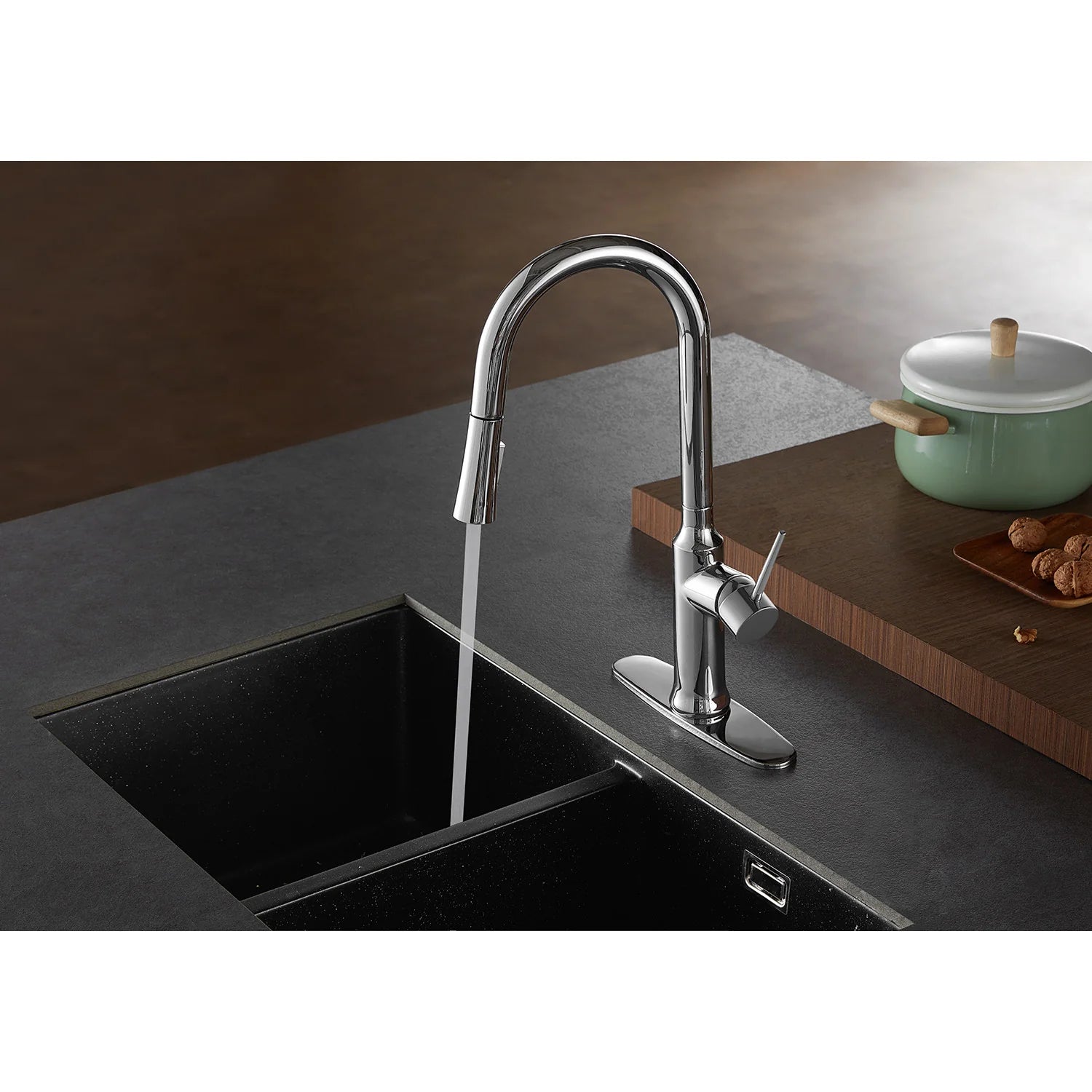 Polished chrome single-handle pull-down kitchen faucet with pull-down spray stream
