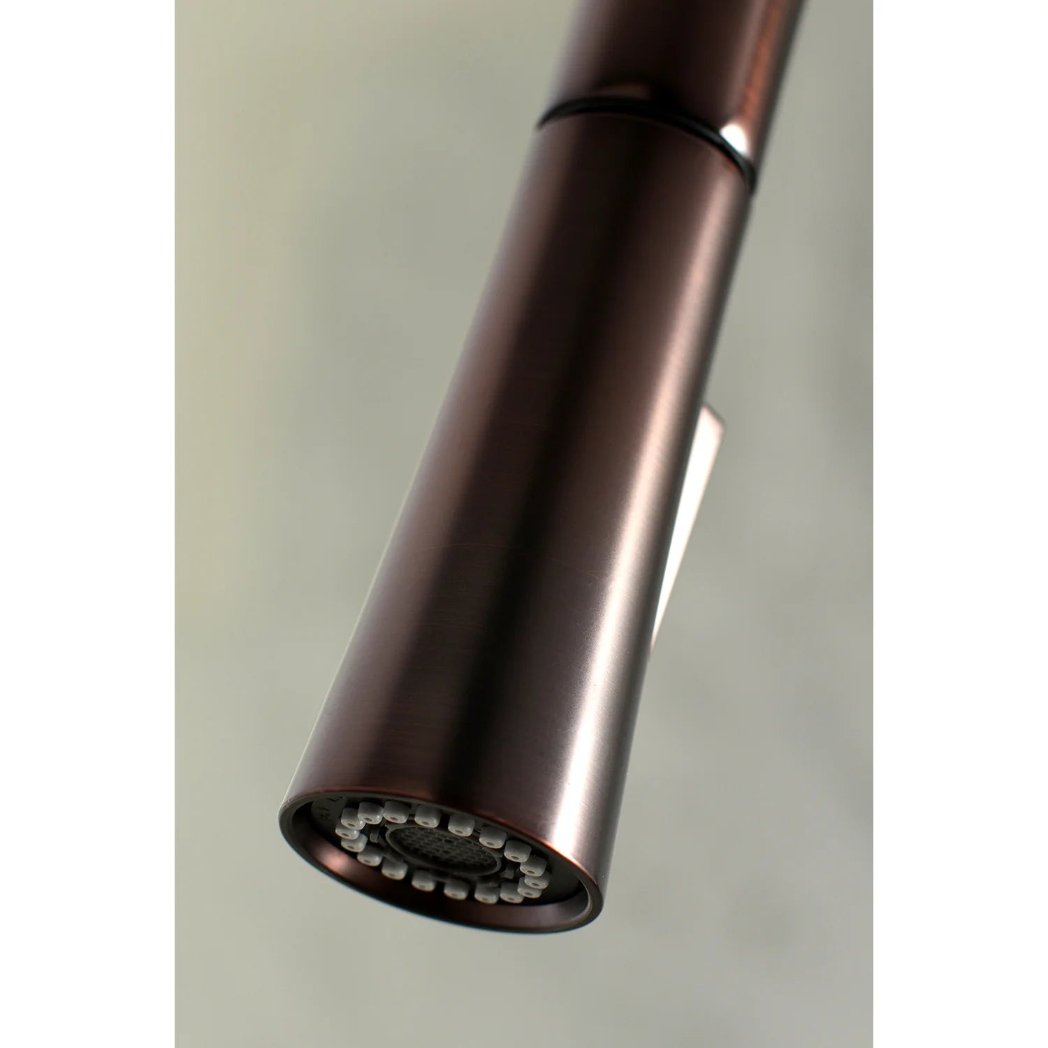 Pull-down spray head underside with clustered jets in oil rubbed bronze finish
