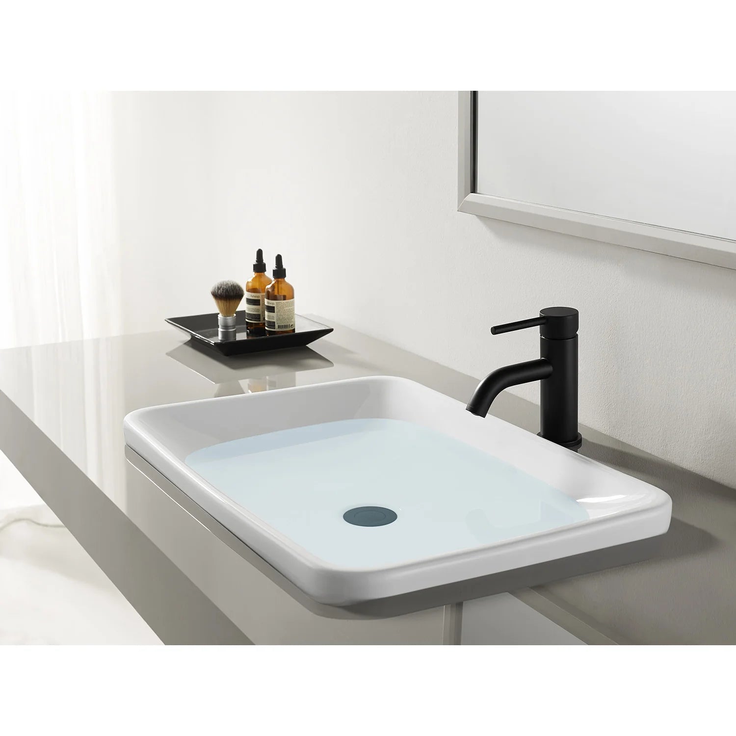 Matte black bathroom faucet installed on single-hole sink countertop