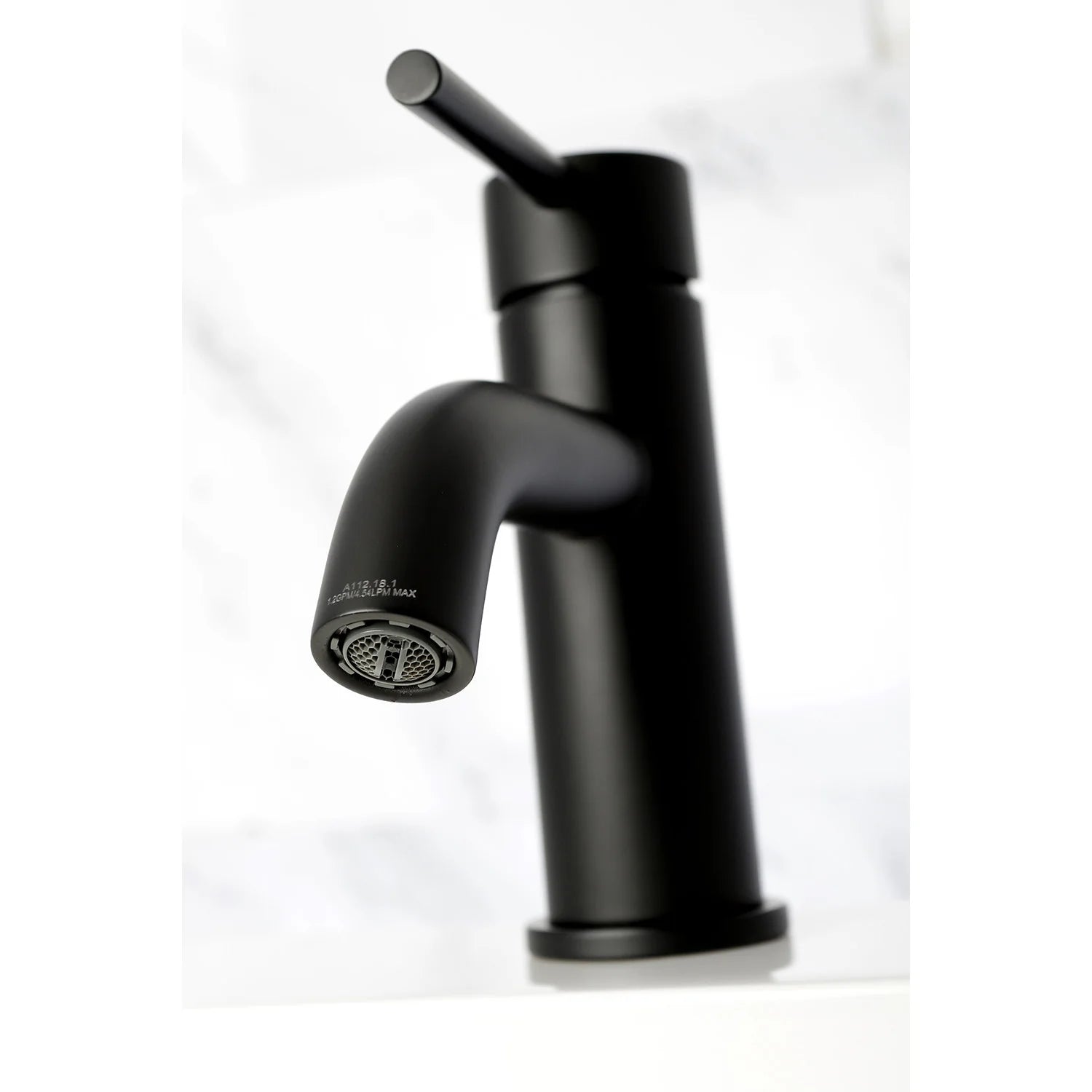 Matte black faucet with aerator tip on curved spout and cylindrical body