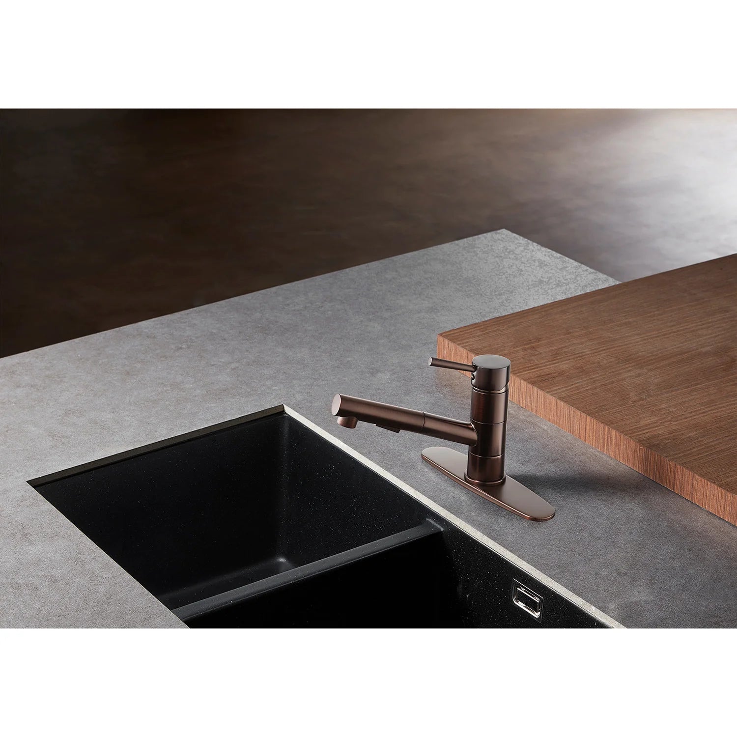 Oil-rubbed bronze pull-out kitchen faucet with single lever over a black sink