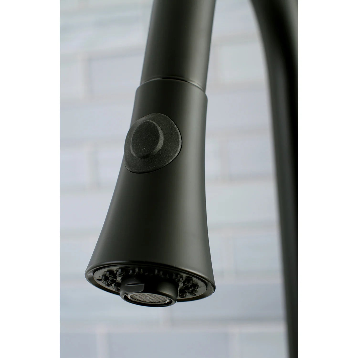 Matte black pull-down kitchen faucet spray head with aerator/nozzle detail