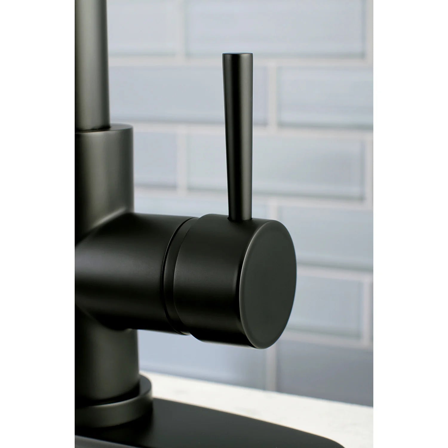 Matte black pull-down kitchen faucet control body with side-mounted handle