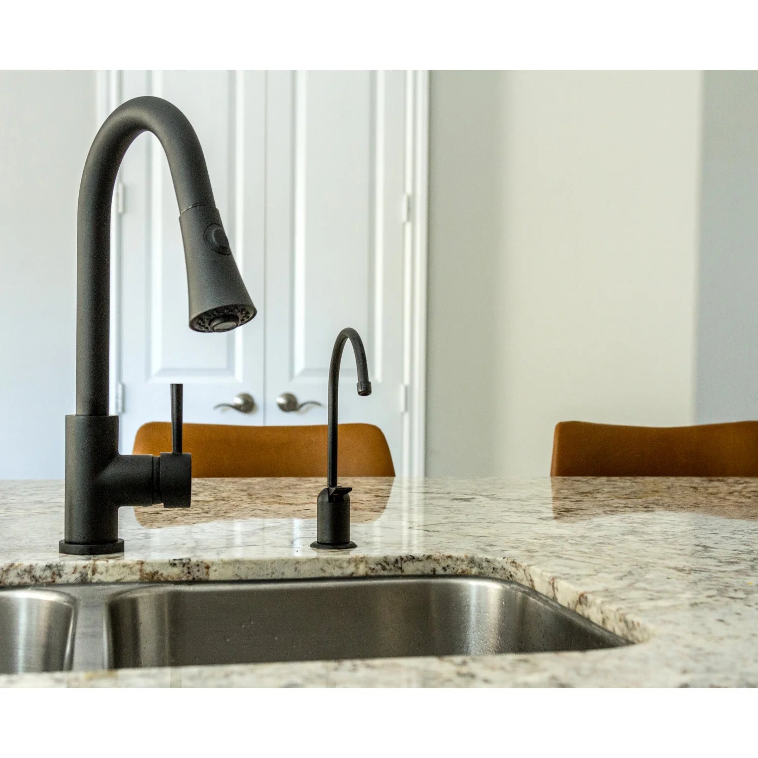 Matte black pull-down kitchen faucet with spray head and single control handle