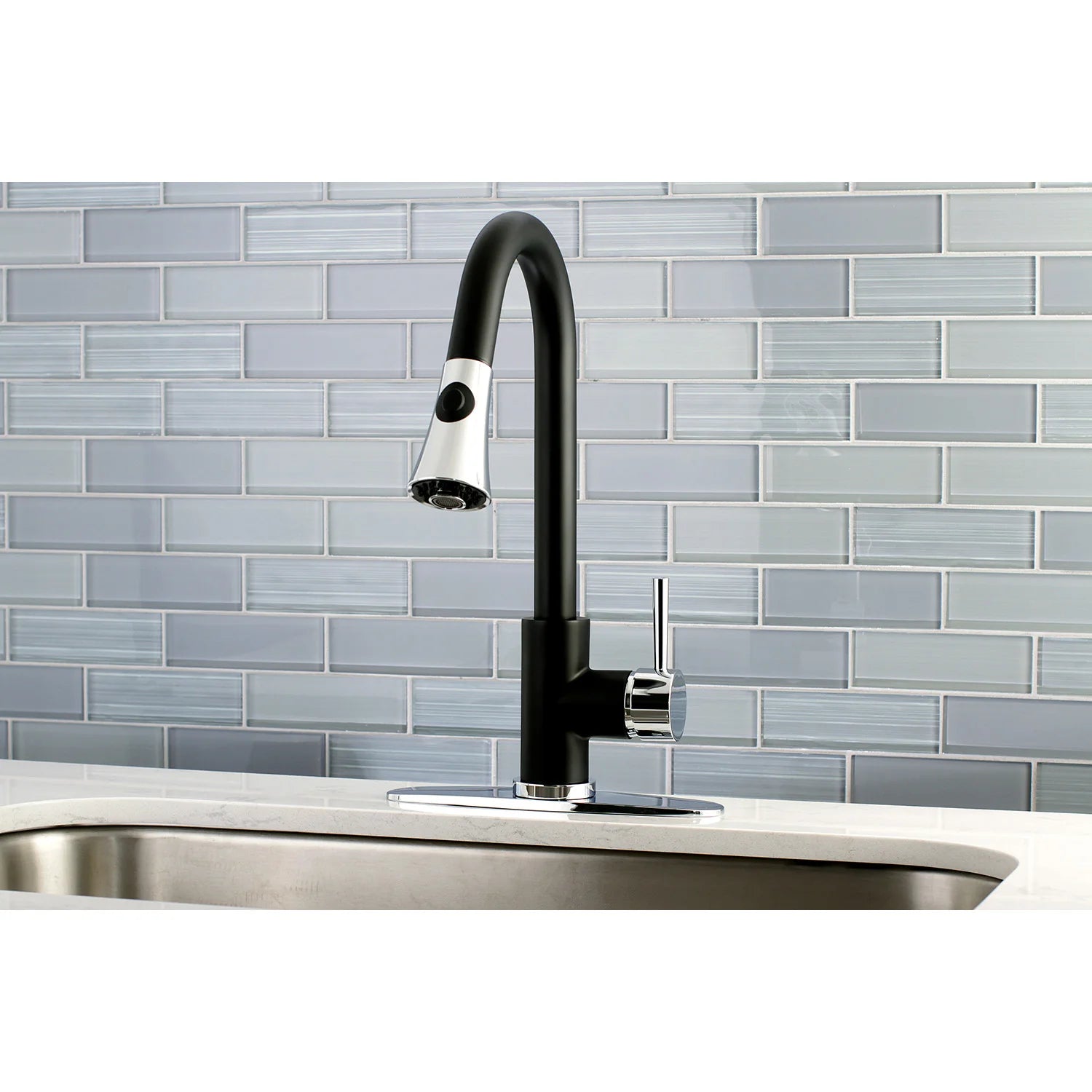 Matte black single-handle kitchen faucet mounted on stainless sink