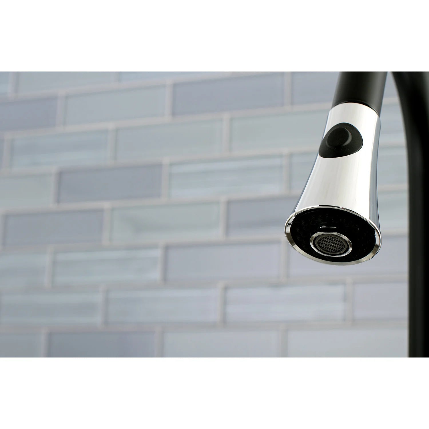 Pull-down sprayer head with black button and chrome aerator outlet