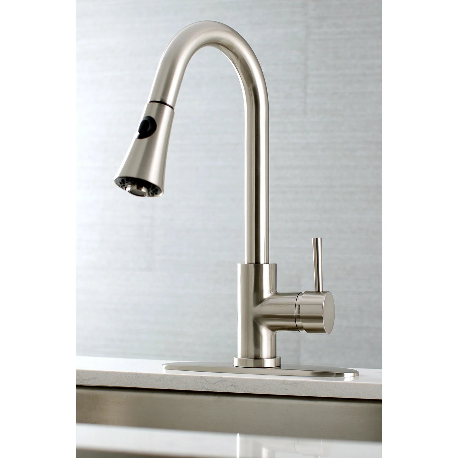 Brushed nickel kitchen faucet with pull-down spout and cylindrical side handle