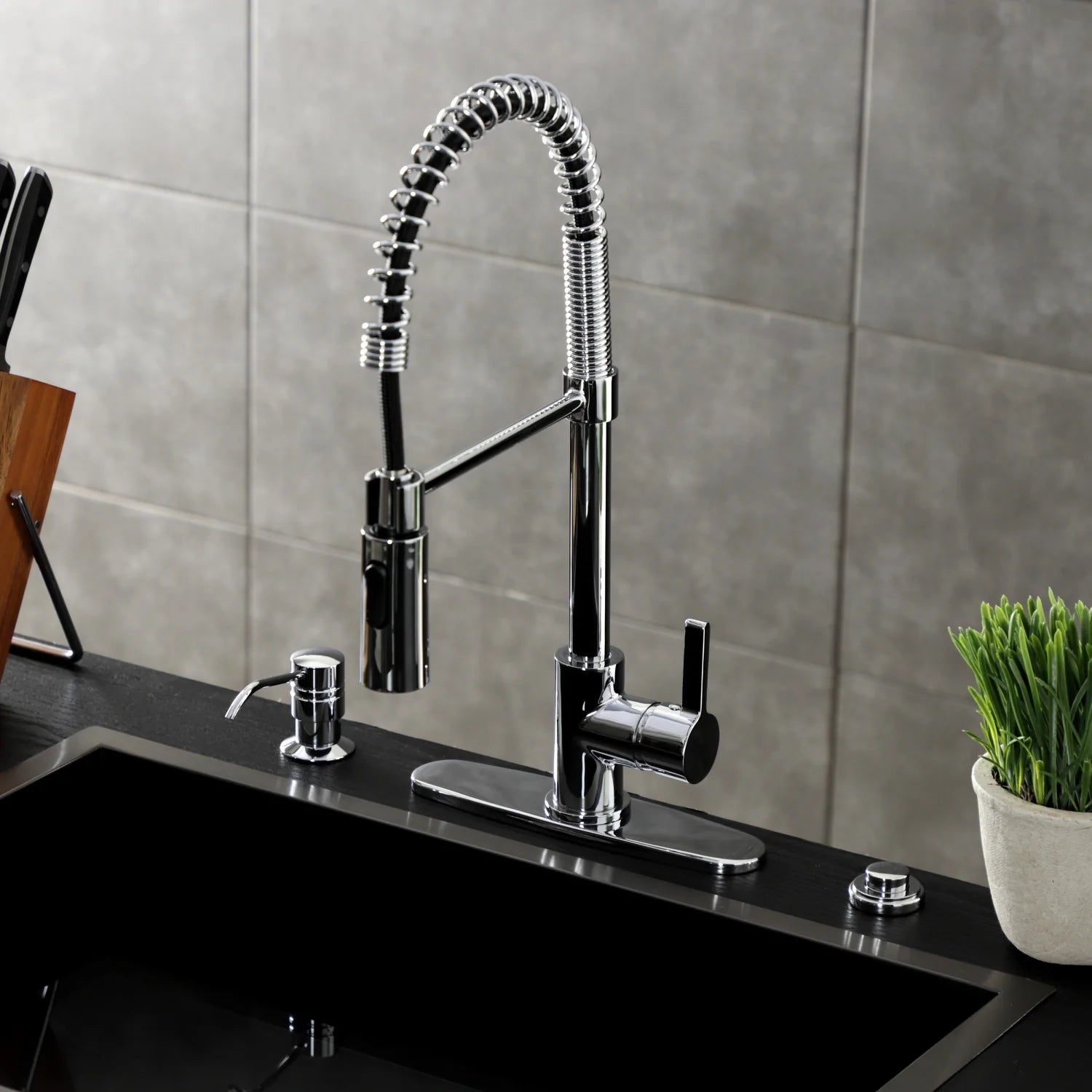 Polished chrome single-handle deck-mount pre-rinse kitchen faucet with spray hose