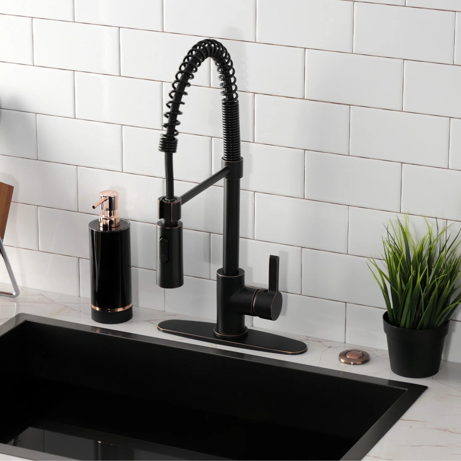 Pull-down deck-mount kitchen faucet with single handle, spray head, and coiled hose
