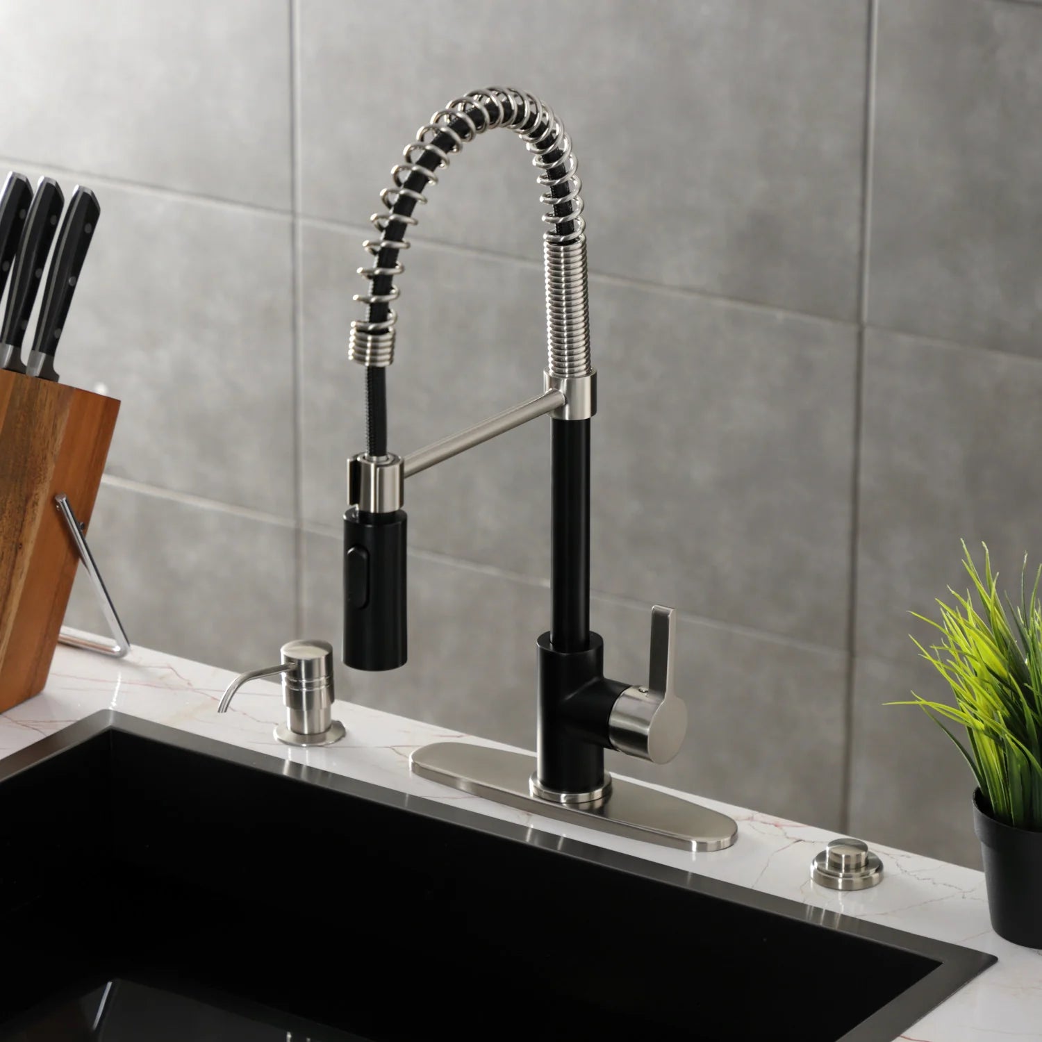 Matte black and brushed nickel deck-mount pre-rinse kitchen faucet with hose and control handle