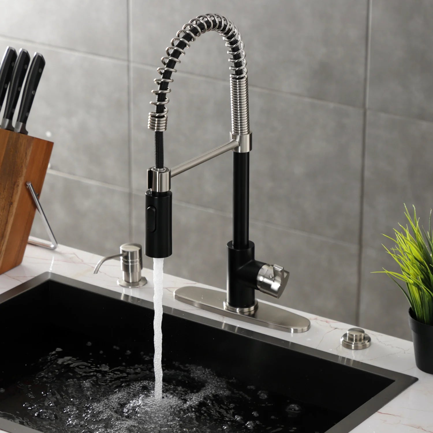 Matte black deck-mount pre-rinse kitchen faucet with spray head and flexible stainless hose