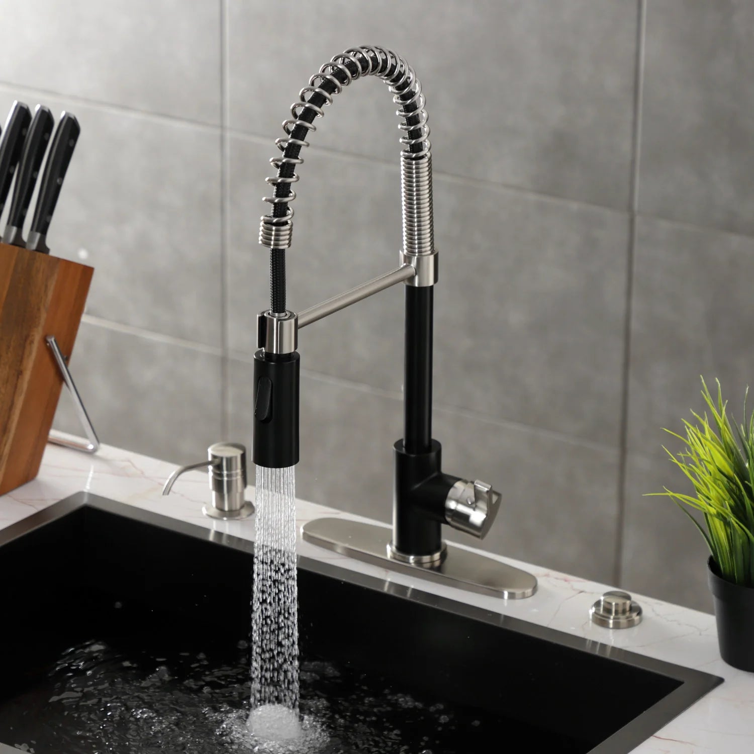 Single-handle deck-mount pre-rinse kitchen faucet in matte black with flexible spray hose
