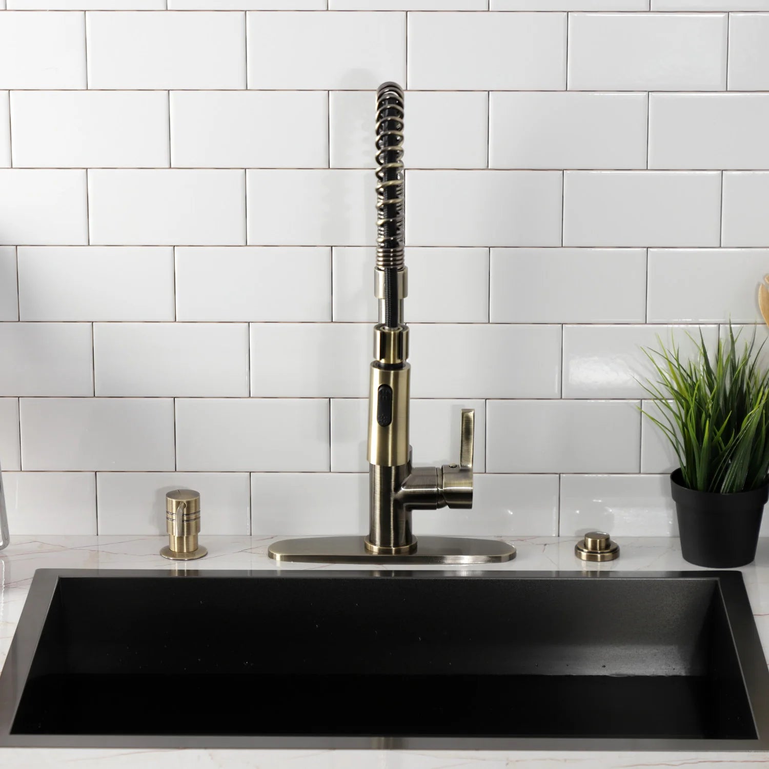 Antique brass deck-mount pre-rinse faucet with vertical spout, pull-down hose, and plate base