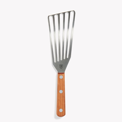 Slotted cast iron turner with light gray head and wood handle