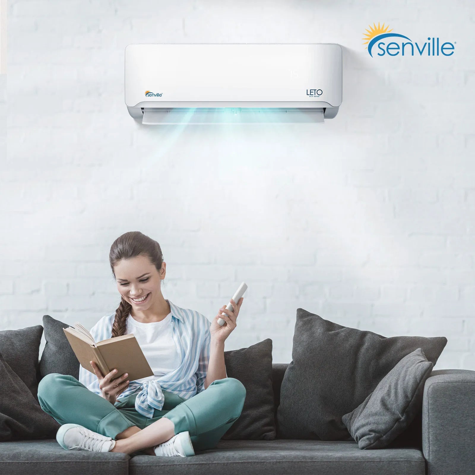 Wall-mounted mini split indoor air handler, white, with vent airflow panel and control light