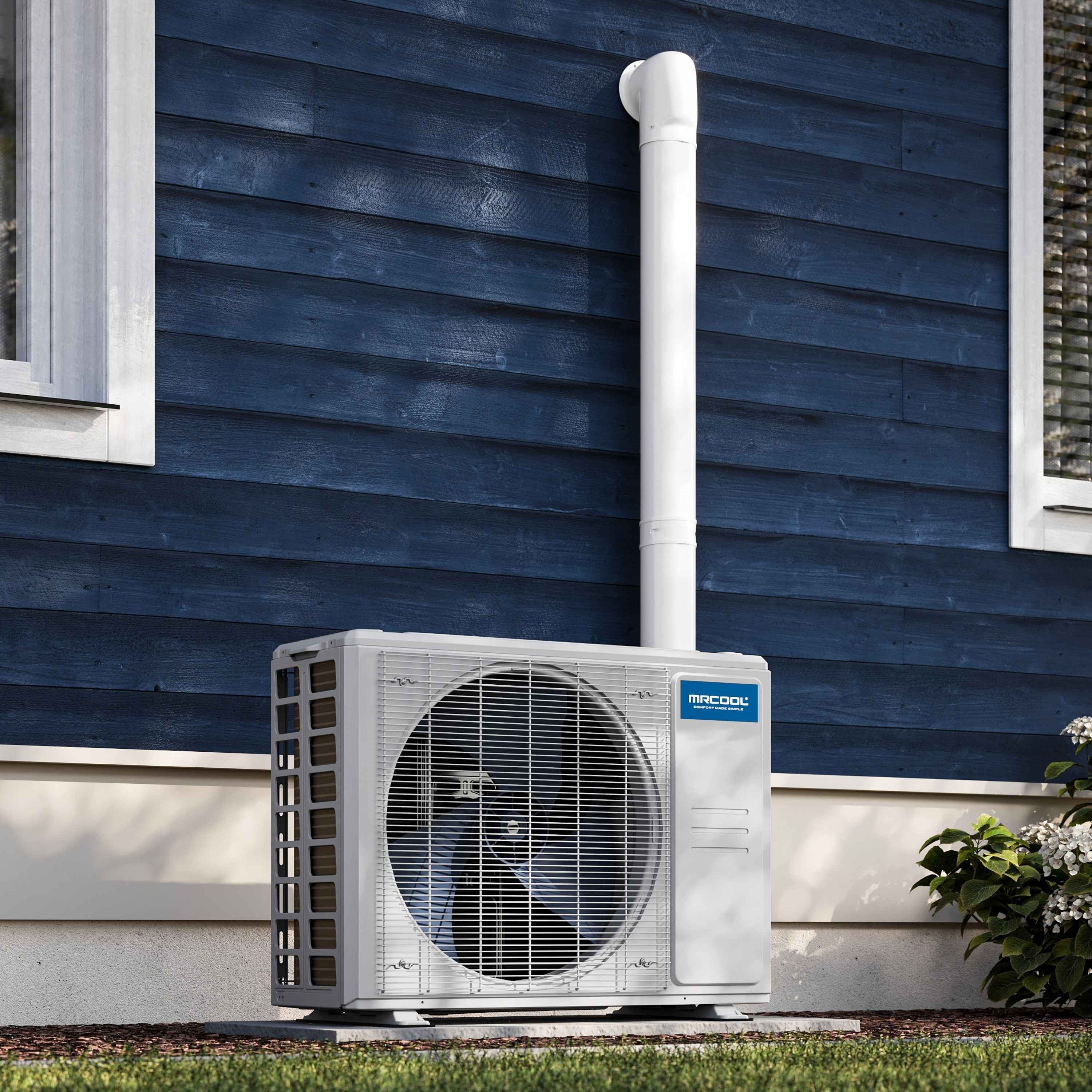 Ductless mini split condenser unit, white outdoor heat pump on a base with fan grille