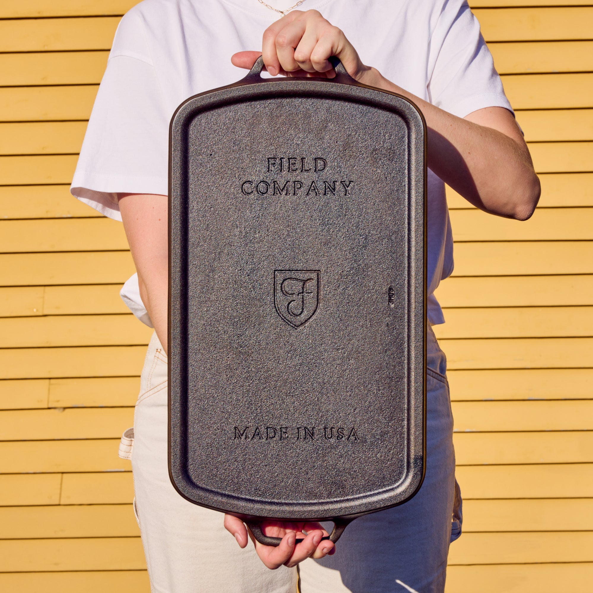Field Company cast iron griddle with raised logo and “MADE IN USA” on face