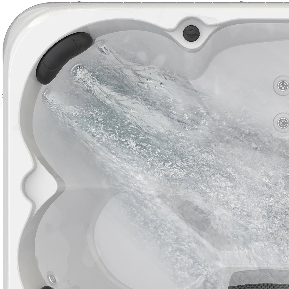 Hot tub close-up with black headrest, swirling water, and side jet nozzle