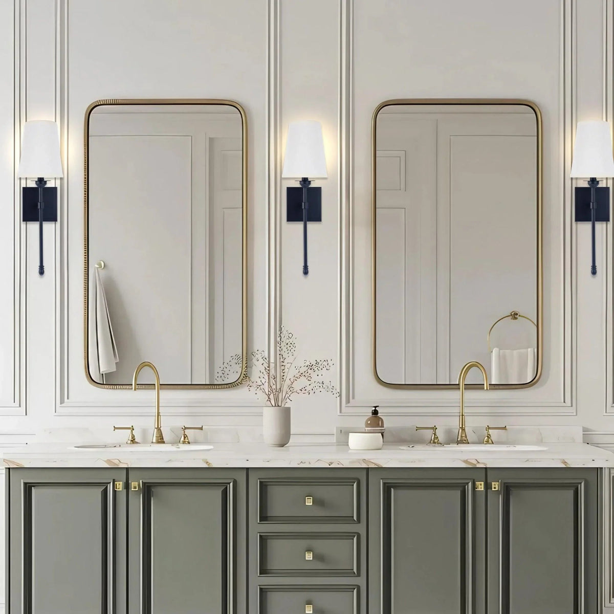 Black 1-light wall sconce with white fabric shade mounted on wall