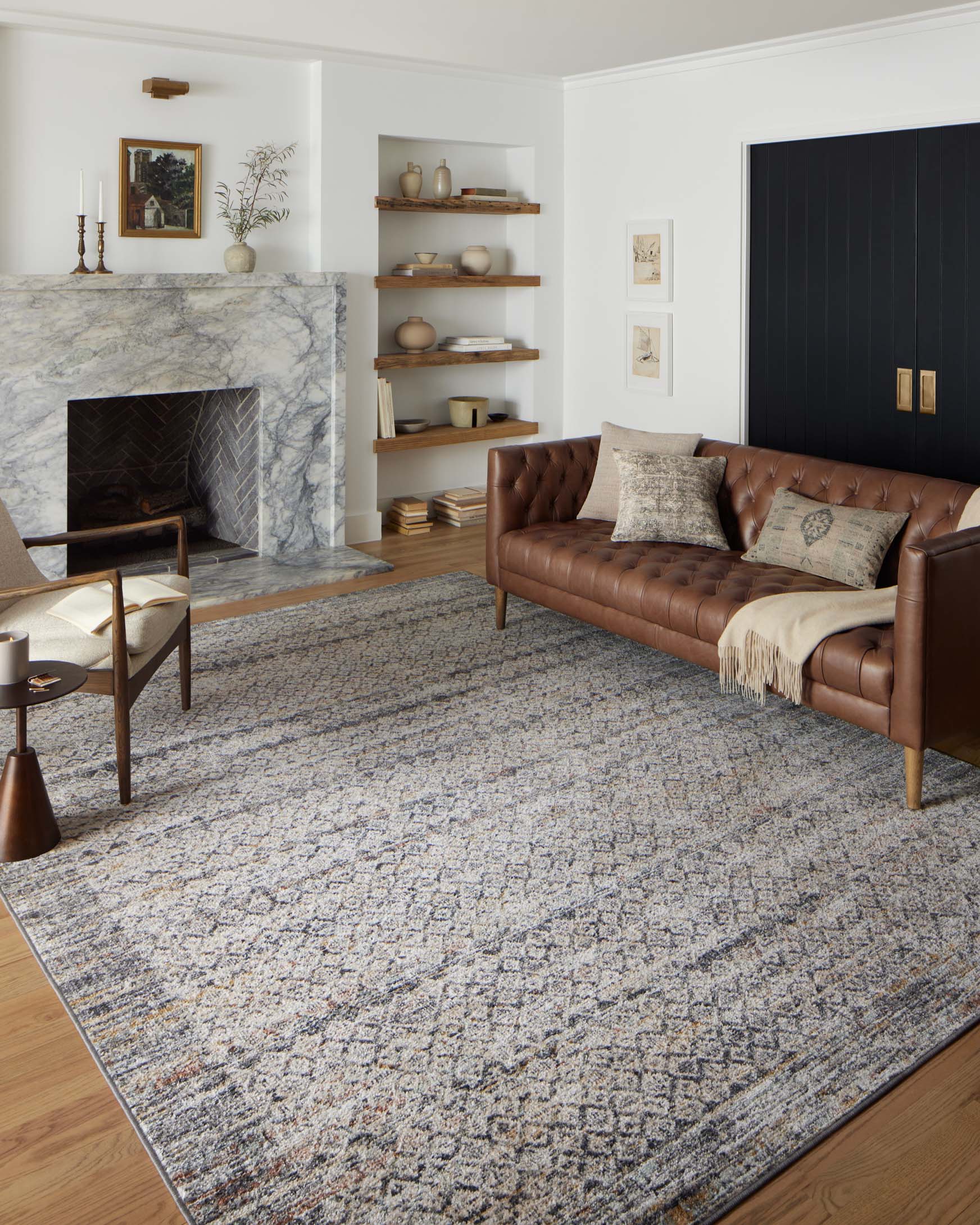 Gray runner rug with speckled abstract pattern and dark, clean-edged border