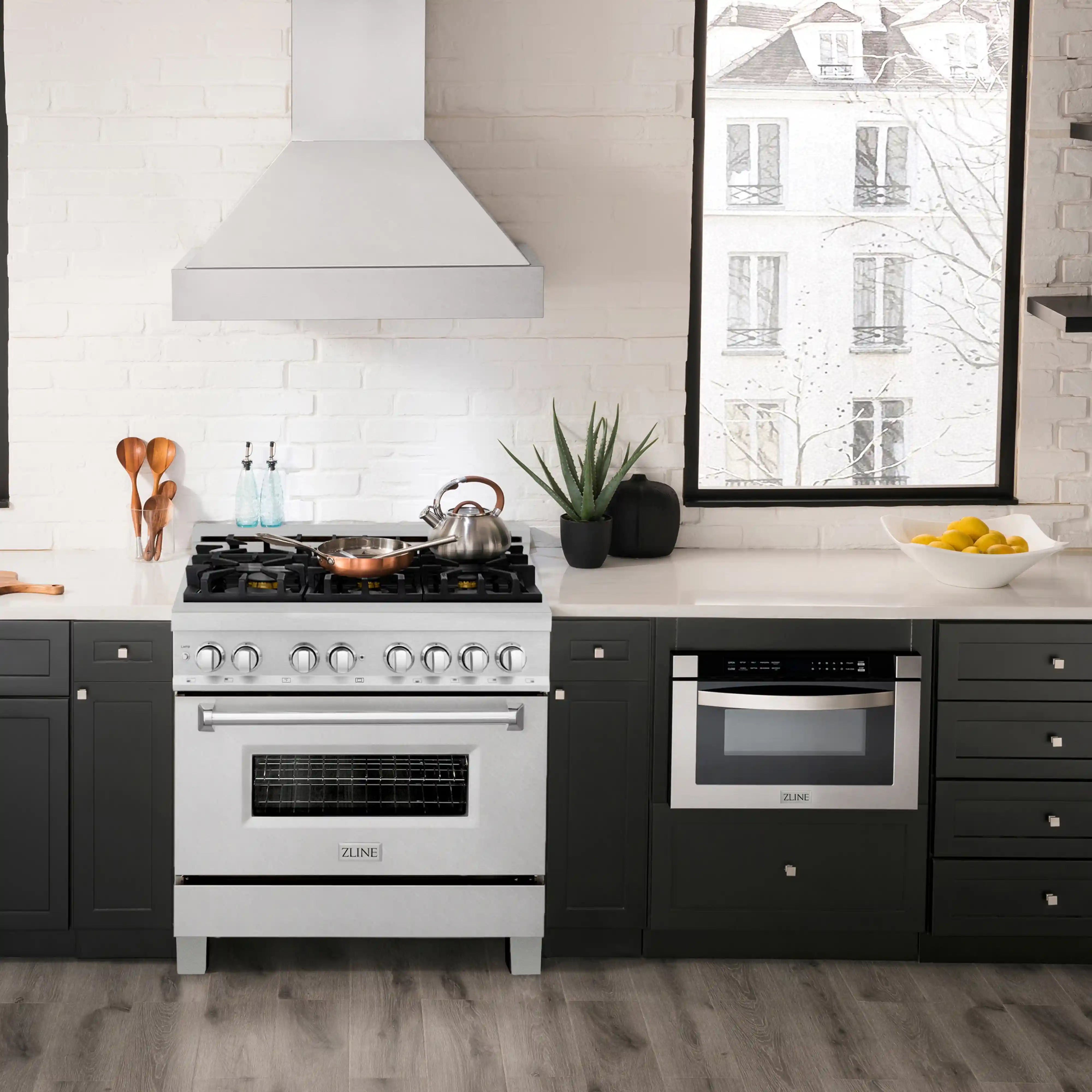 Satin stainless dual fuel range in kitchen with six-burner cooktop and oven