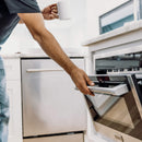 Built-in stainless microwave oven with open door and side handle