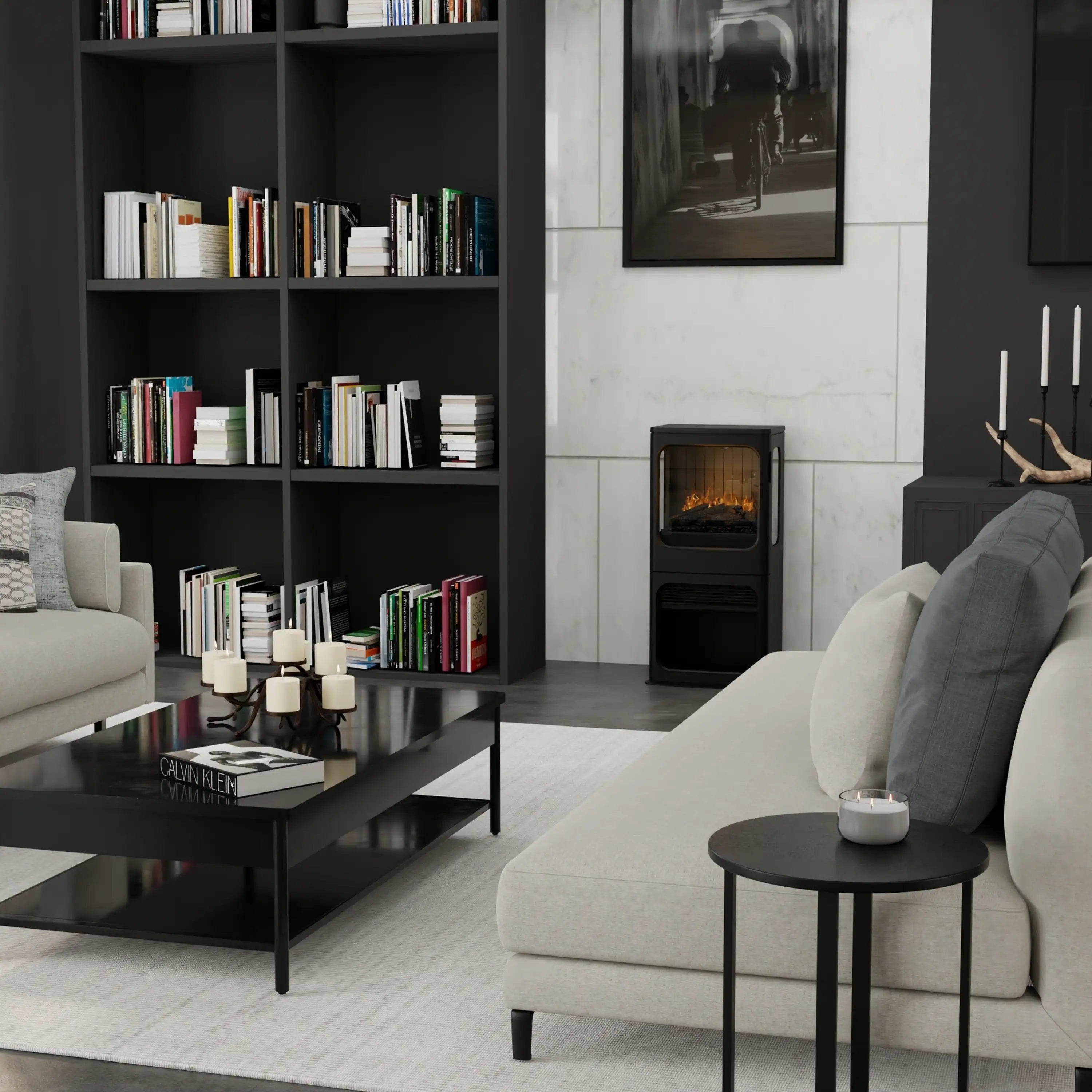 Freestanding black water vapor fireplace with visible flames on a glass front.