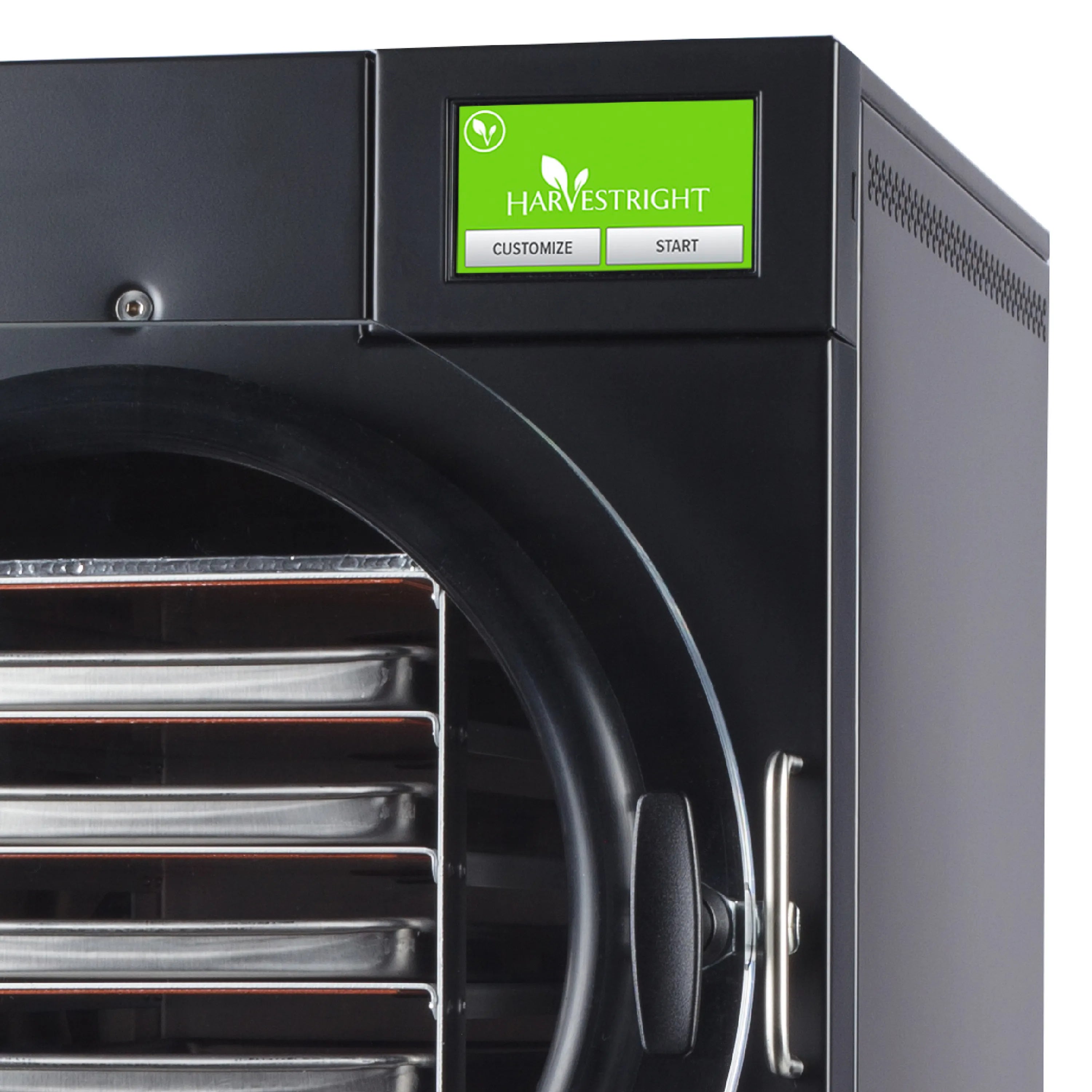 Black freeze dryer control screen above round chamber door opening