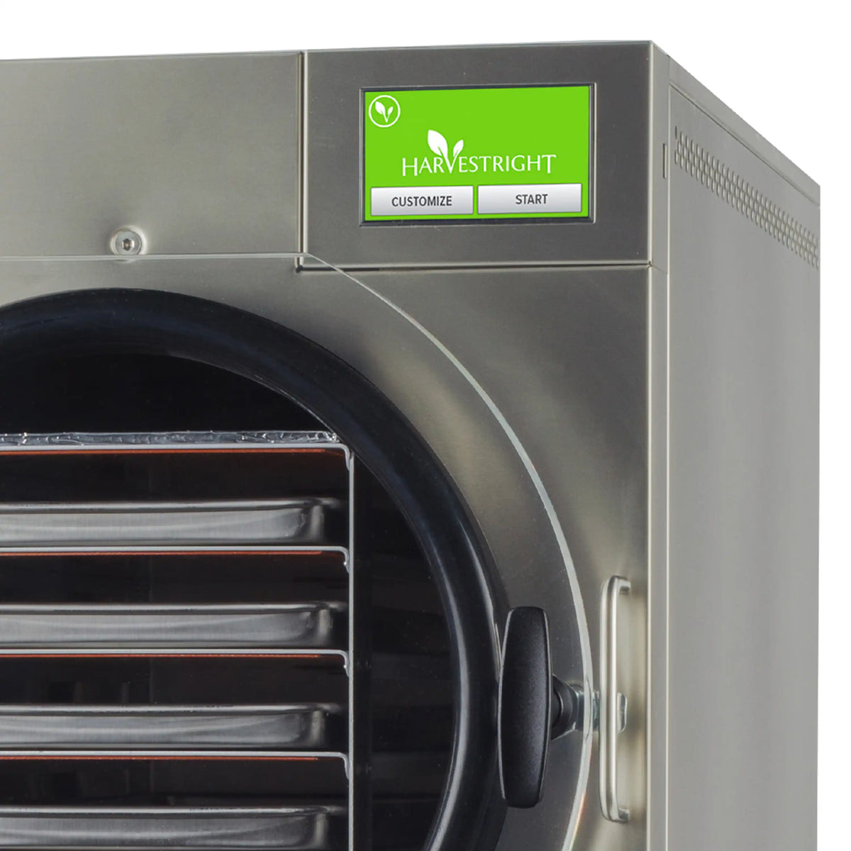 Freeze dryer front with circular door and green control panel display