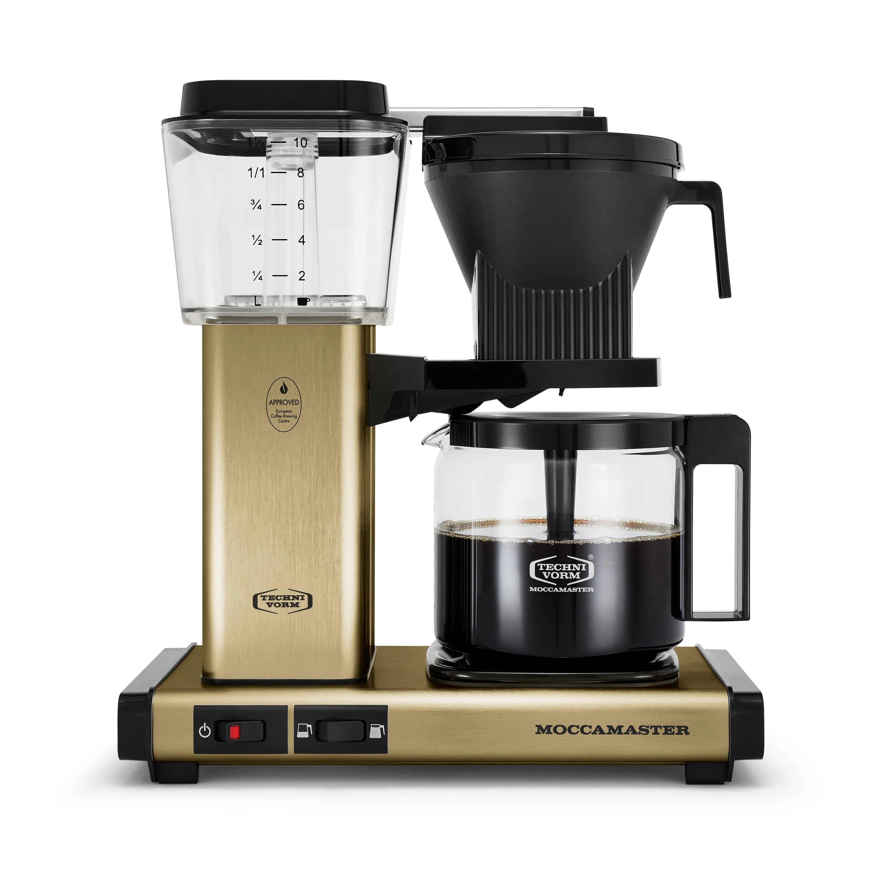 Moccamaster coffee maker with brushed gold housing, clear glass carafe and black top