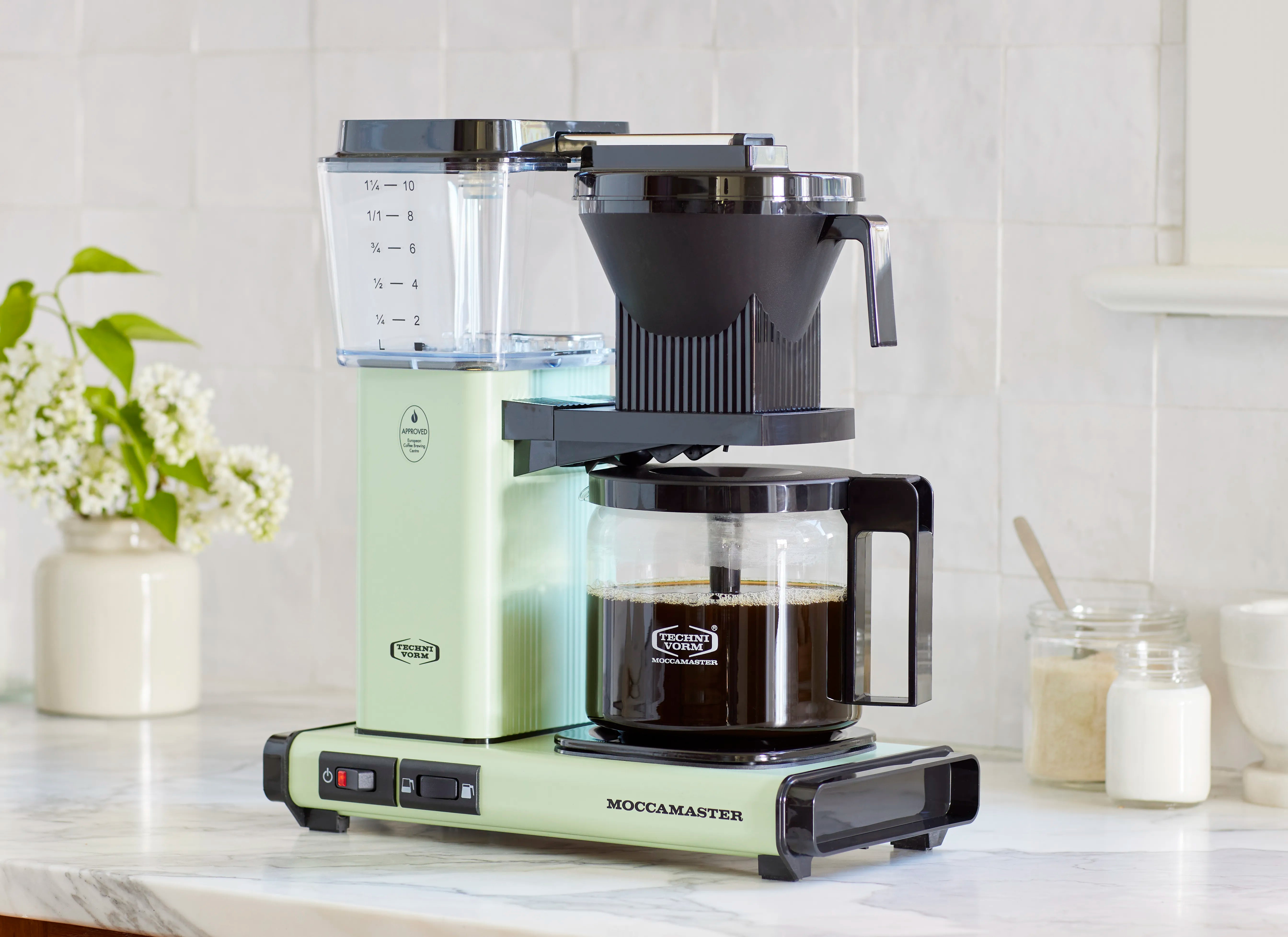 Pistachio Moccamaster coffee maker with clear water tank and glass carafe