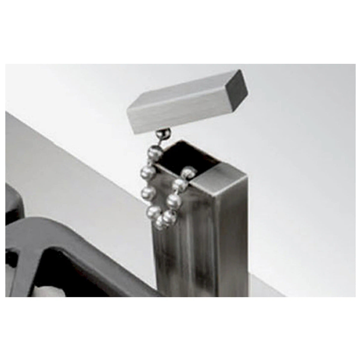 Stainless steel gas range burner control with multiple black knobs and metal fittings