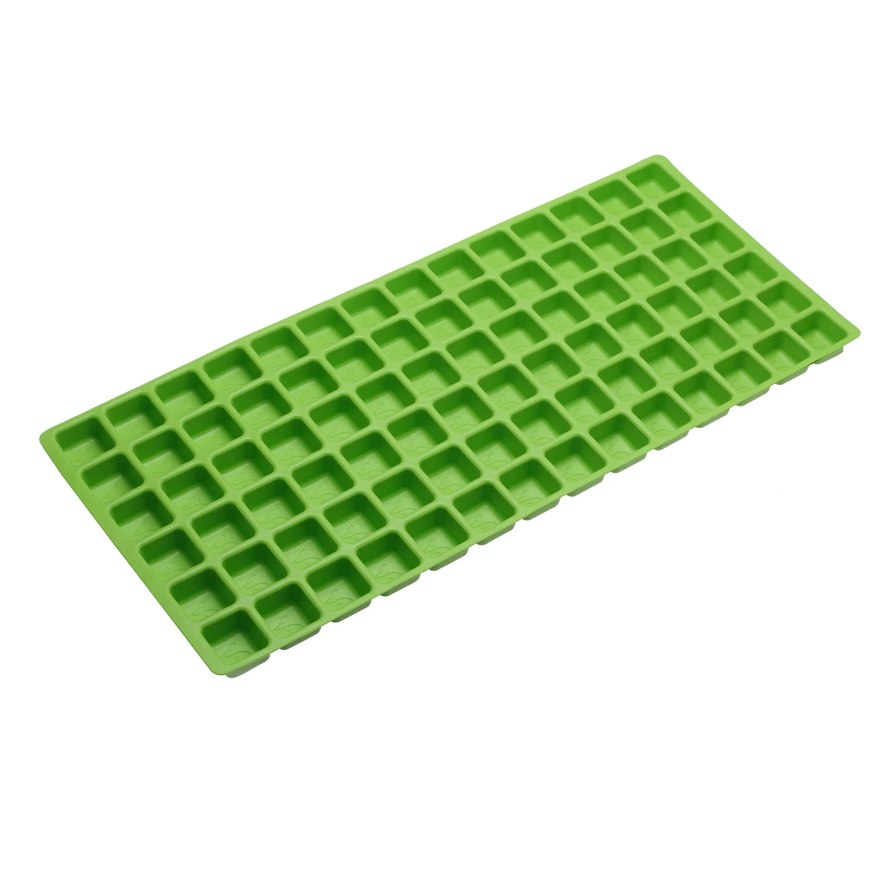Lime green silicone food mold tray, rectangular with square-grid cavities